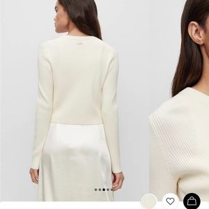 Beautiful Hugo Boss off white button up cardigan. This is a quality sweater.